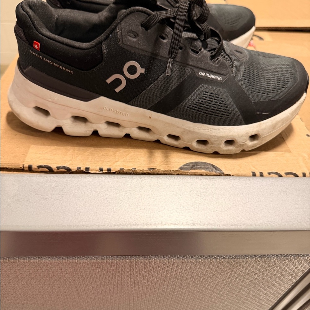 On Running Charcoal and White Athletic Shoes